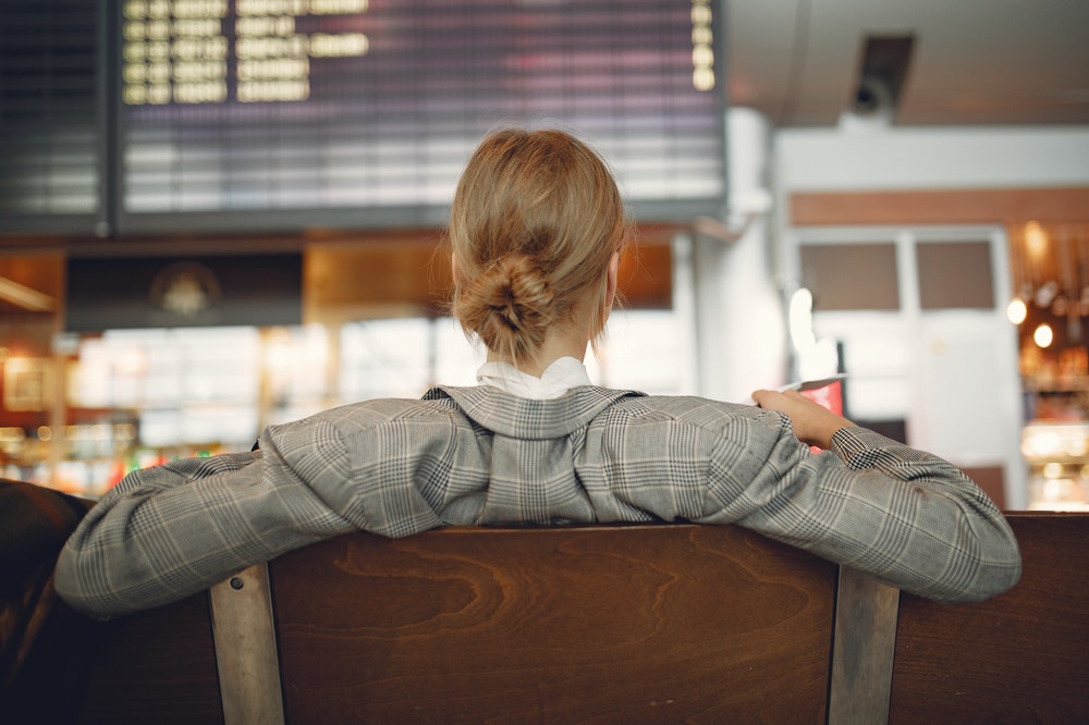 Woman waiting at an airport